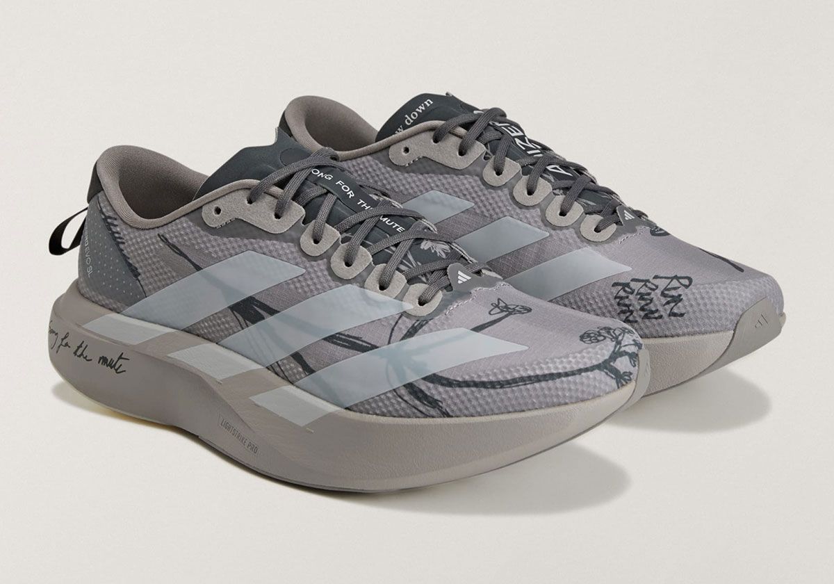 Song for the Mute x adidas adiZero EVO SL collaboration in grey and brown with hand-drawn floral graphics and DIY typography