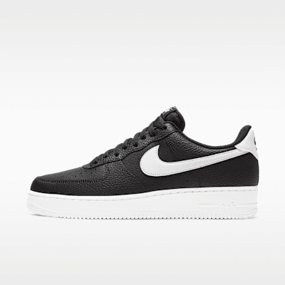 Nike Air Force 1 '07 in Black and White colorway, full side view showing the classic leather upper and white midsole