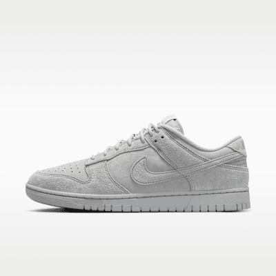 Nike Dunk Low Retro SE in Wolf Grey colorway, full lateral view showing tonal grey upper and gum rubber outsole