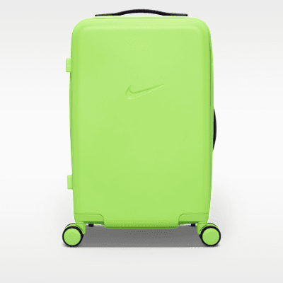Nike Carry-On Luggage 22" Hardshell in Electric Green/Black with 52L capacity, front three-quarter view showing polycarbonate shell construction