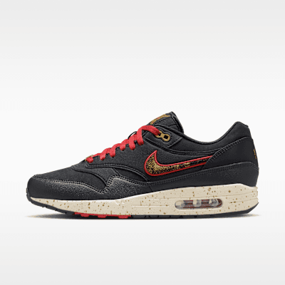 Nike Air Max 1 'Pirates' in Black/Coconut Milk/Gym Red, side profile showing exposed Air Max cushioning unit and colorway blocking