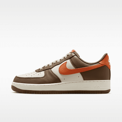 Nike Air Force 1 '07 in Mosswood Brown, Coconut Milk, and Campfire Orange colorway—full lateral view showing reinforced toe cap and gum rubber sole