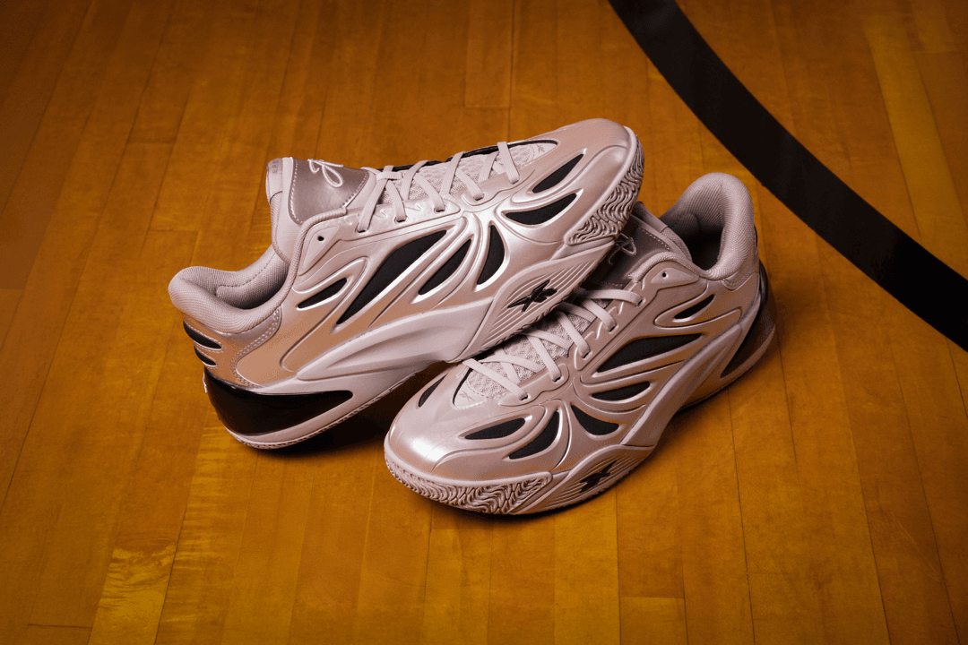 Reebok Angel Reese 1 in Rose Dust colorway, showing side profile of the signature basketball silhouette