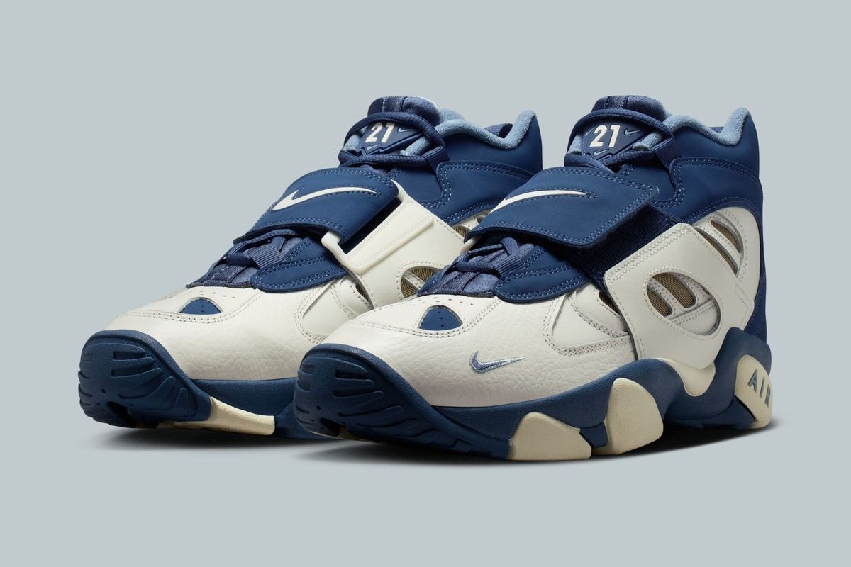 Nike Air Diamond Turf II in Blue Grey colorway, showing muted grey and blue tonal upper with mid-top silhouette