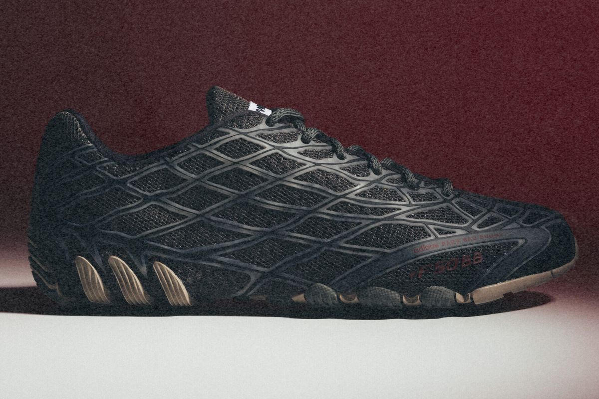 Bad Bunny x adidas F50 Ghost Sprint in Charcoal colorway, side profile showing minimal upper construction and responsive midsole design