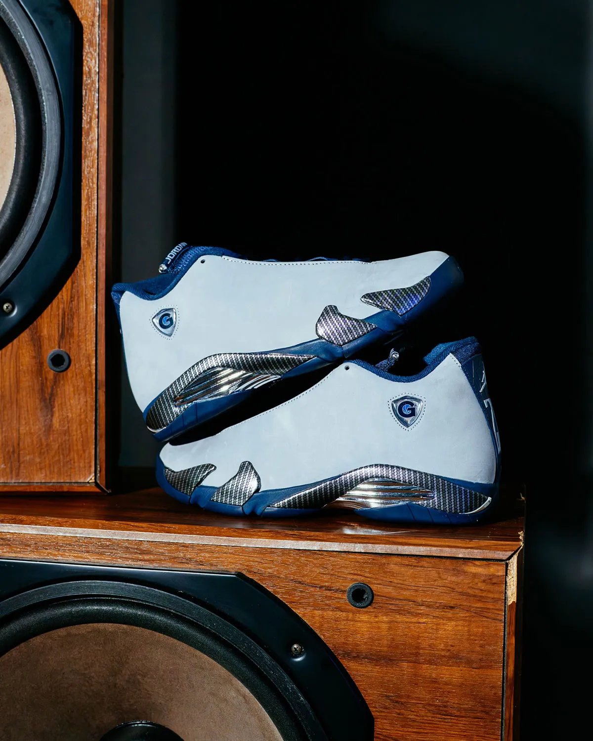 Air Jordan 14 PE in light grey nubuck with navy accents and carbon fiber midsole, Georgetown G logo on lateral shield - detail view 2