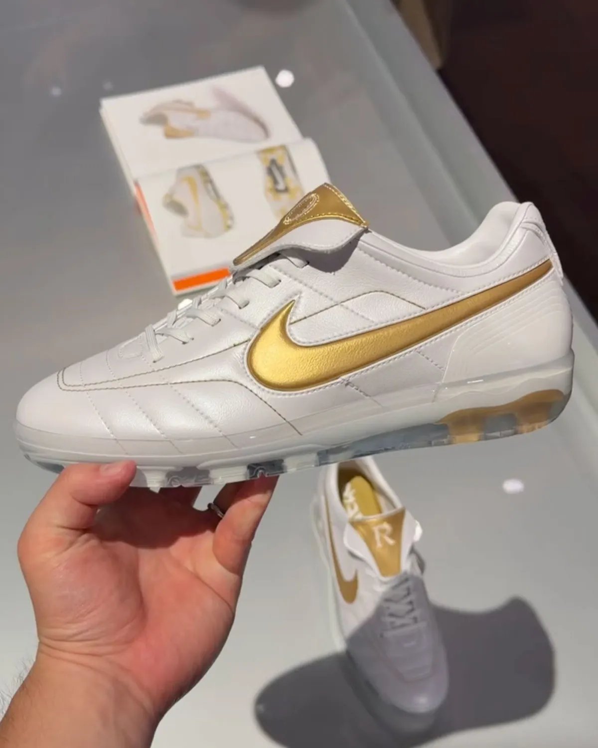Nike Cryoshot Tiempo Legend in Touch of Gold colorway with gilded accents and quilted upper - detail view 1