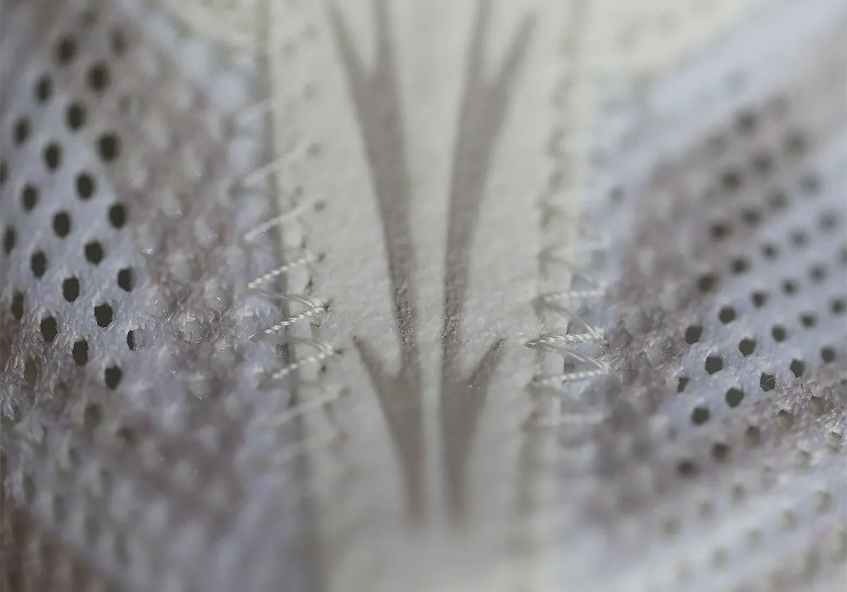 Nike Zoom Streak 3 in Cream II/Sail colorway, showing the flush upper construction and neutral palette of the 2009 performance runner returning as a lifestyle model - detail view 4