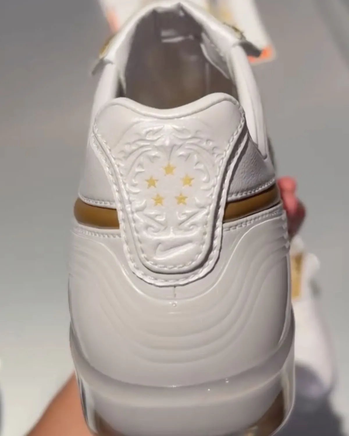 Nike Cryoshot Tiempo Legend in Touch of Gold colorway with gilded accents and quilted upper - detail view 2