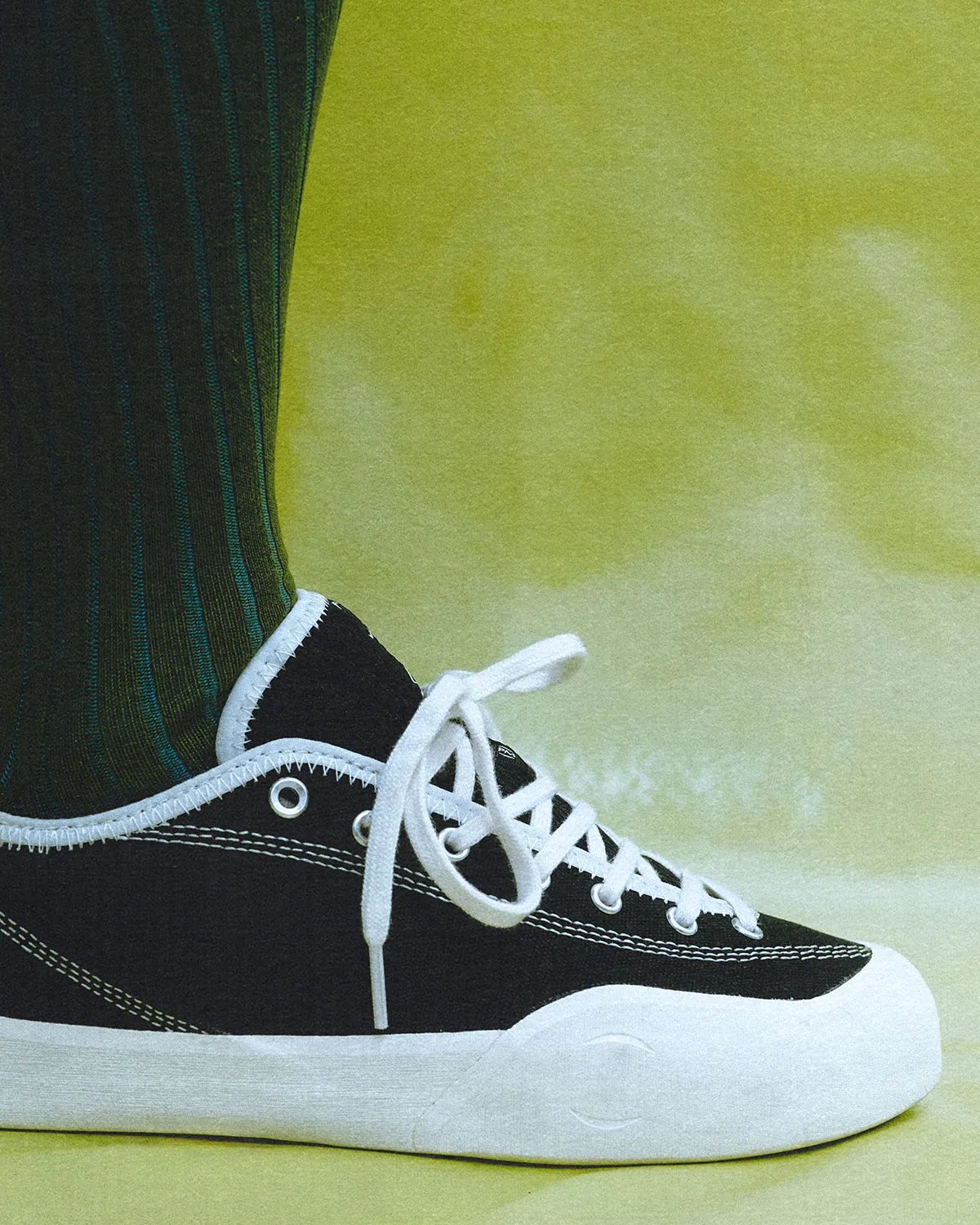 Village PM 2PM silhouette in neutral colorway, showcasing higher-cut structure and asymmetrical design profile - detail view 3