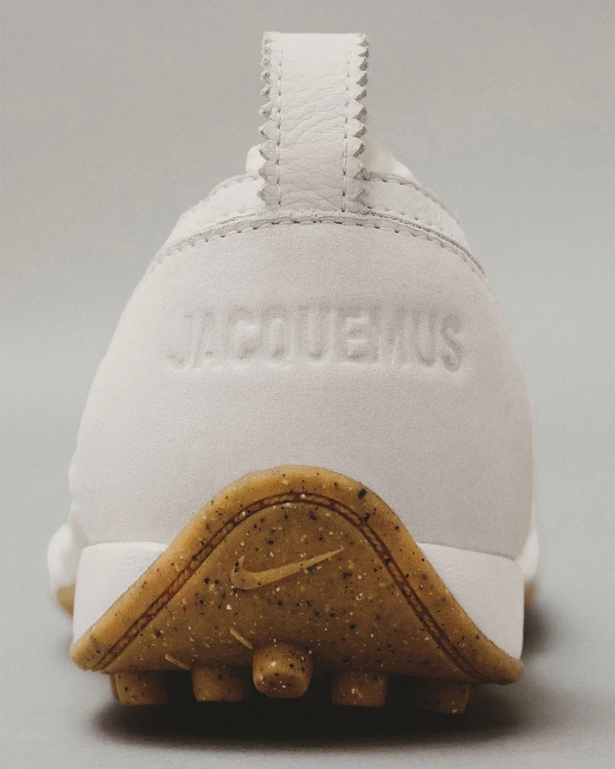 Nike x Jacquemus Moon Shoe collaboration featuring refined proportions and streamlined silhouette - detail view 3