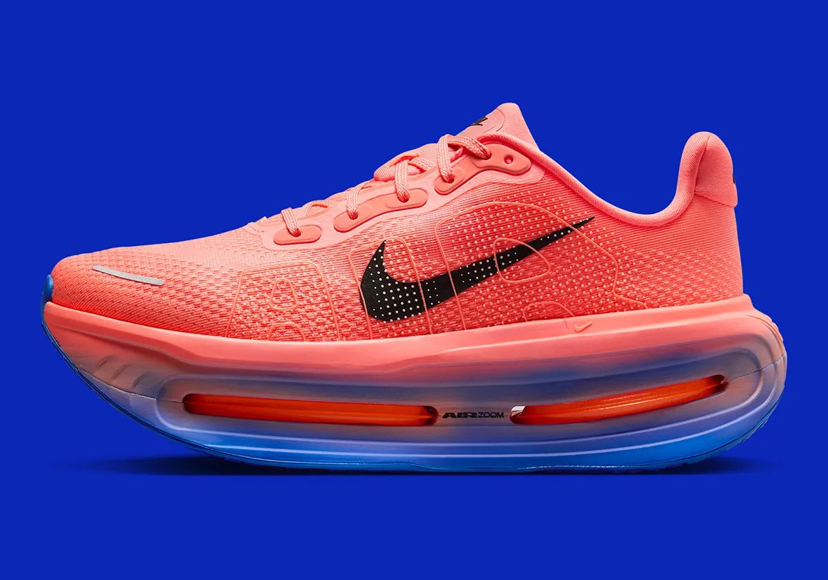 Nike Vomero Premium in Crimson and Blue colorway with gradient midsole detail and repositioned Nike Run tongue emblem - detail view 1