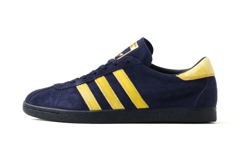 adidas Originals x atmos Tobacco KOYO in navy leather with yellow velour Three Stripes and brown leather with orange velour detailing, inspired by Japanese autumn foliage