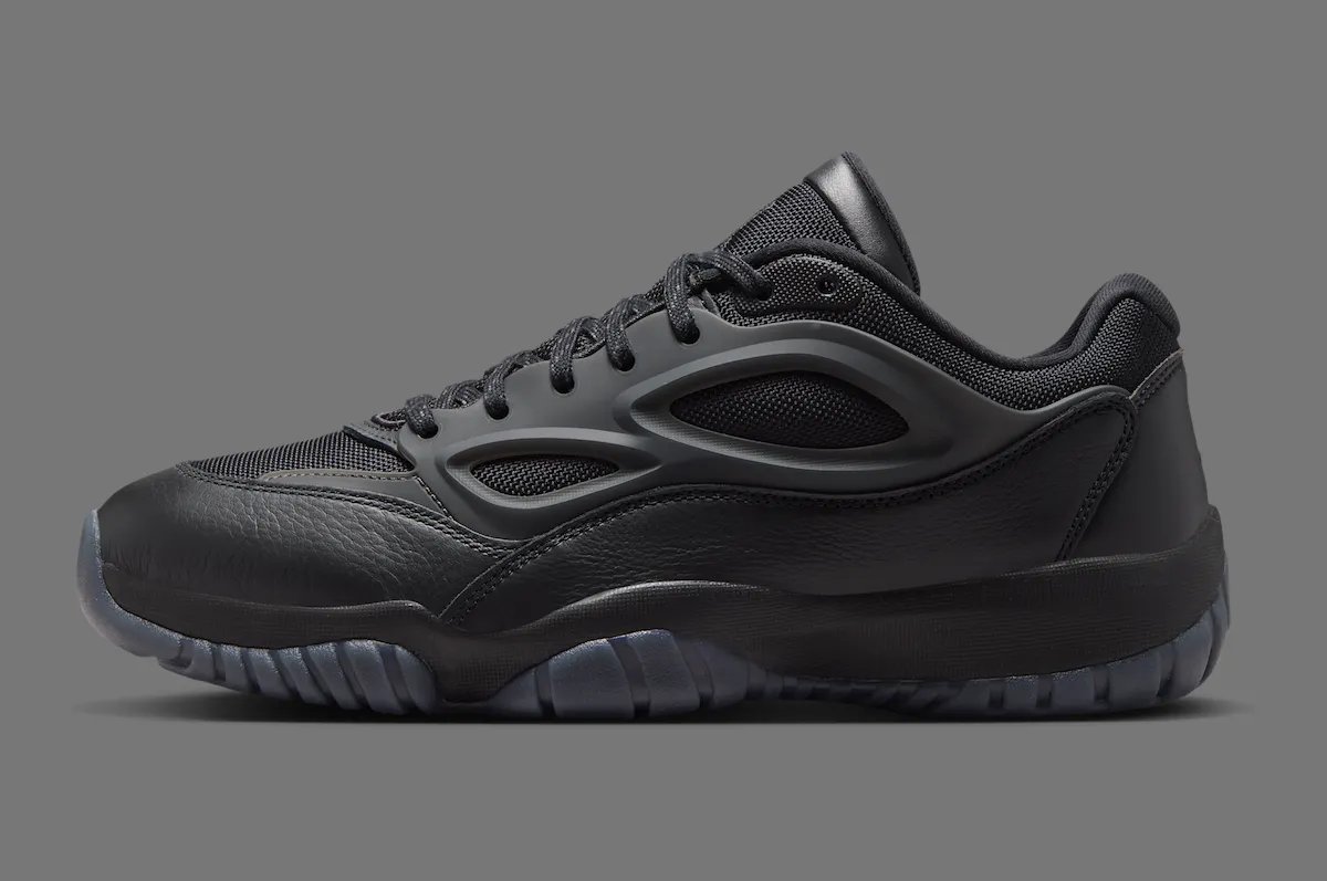 Jordan DMSN 95 in Black/Dark Smoke Grey showing mesh upper and molded TPU cage detail - detail view 3