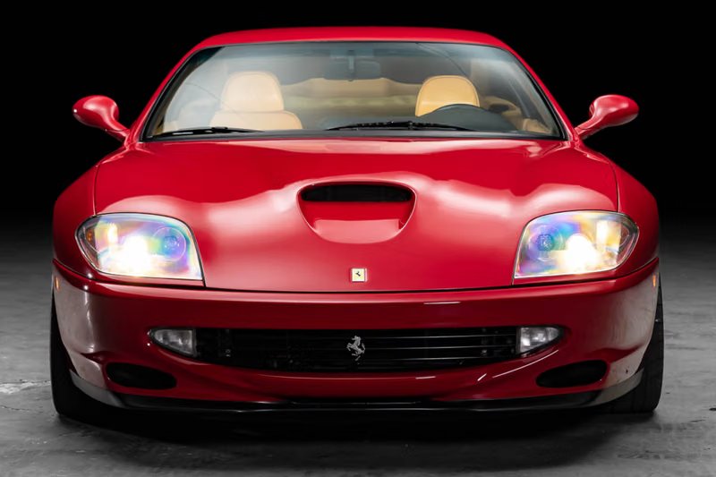 Michael Jordan's custom 1997 Ferrari 550 Maranello in Rosso Barchetta, the Italian grand tourer that inspired the Air Jordan XIV design - detail view 5