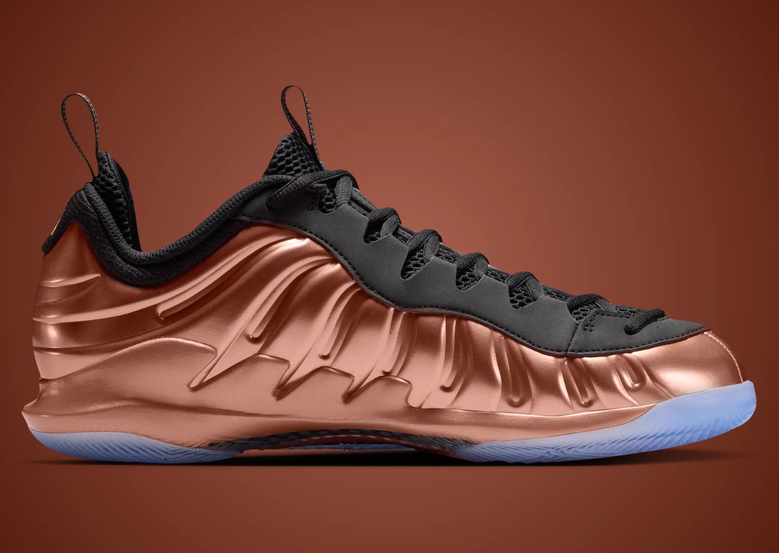 Nike Zoom Vapor X Posite in Copper colorway featuring Foamposite-inspired panels and icy blue outsole - detail view 4