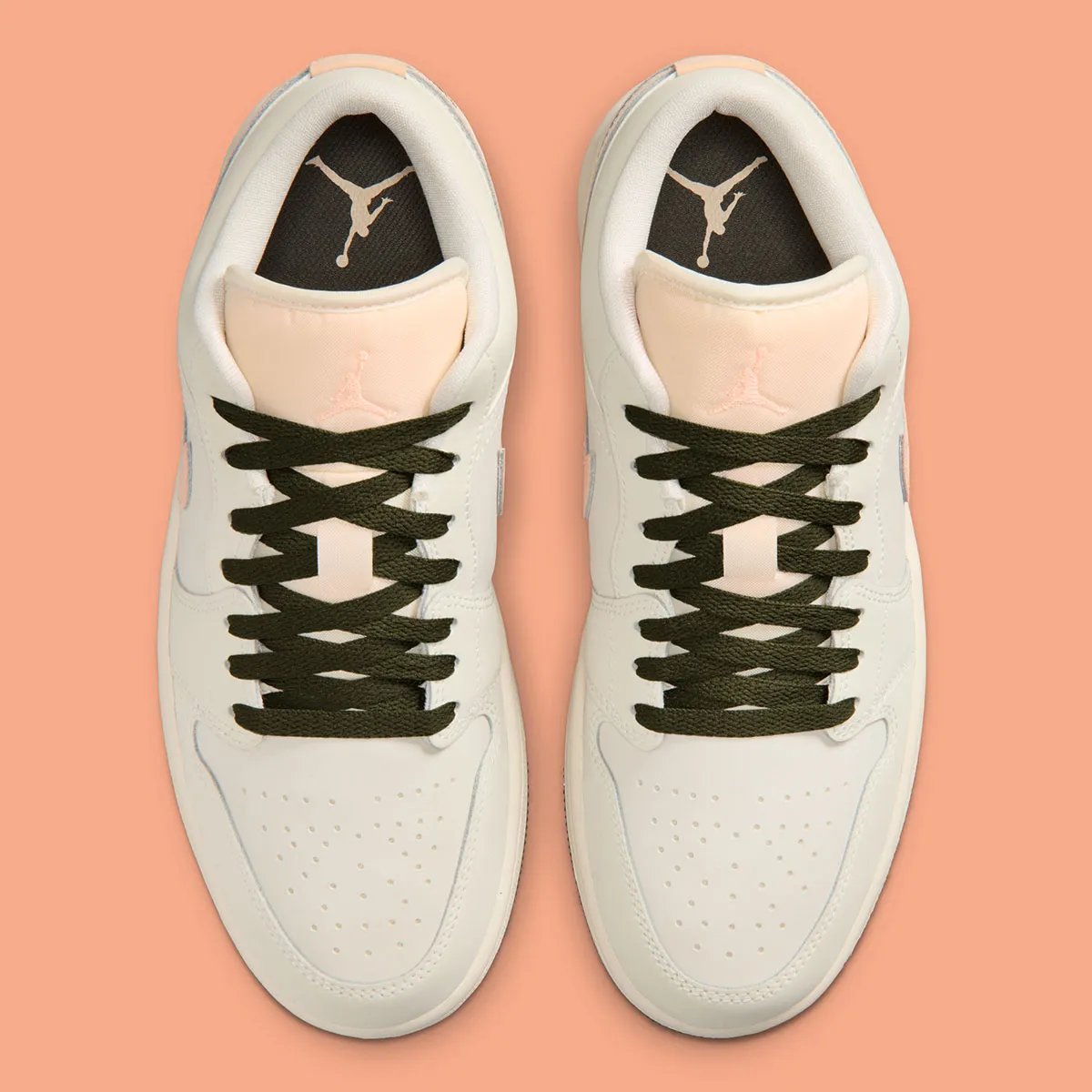 Nike Air Jordan 1 Low in Crimson Tint colorway, showing leather construction and ankle collar detail - detail view 3
