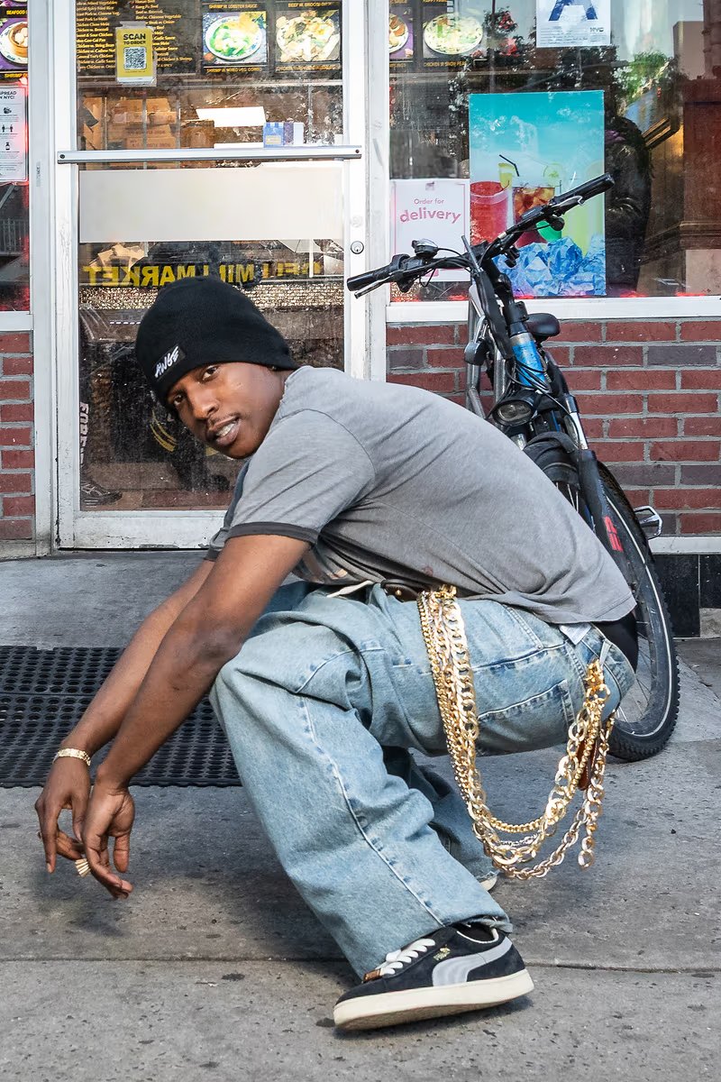 A$AP Rocky x PUMA Suede '94 in black with gold lace keeper and retro quarter-panel logo, July 2026 release - detail view 3