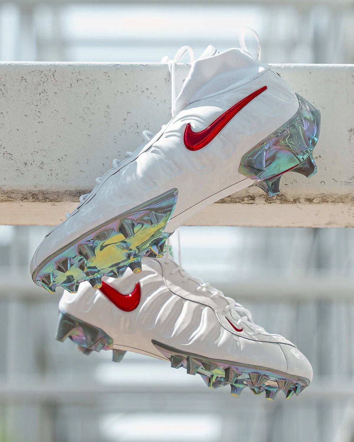 Nike Vaporposite Pro PE in white with metallic red Swoosh and green buckeye leaf logo, exclusive to Ohio State football