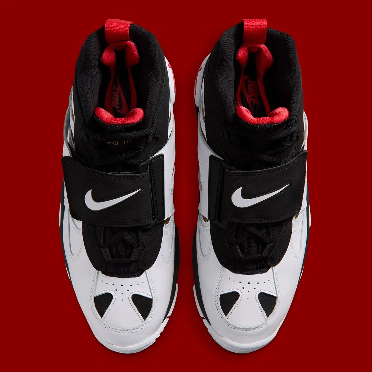 Nike Air Diamond Turf II '49ers' retro sneaker with black leather, white side panels, gold mesh, and red branding details - detail view 4