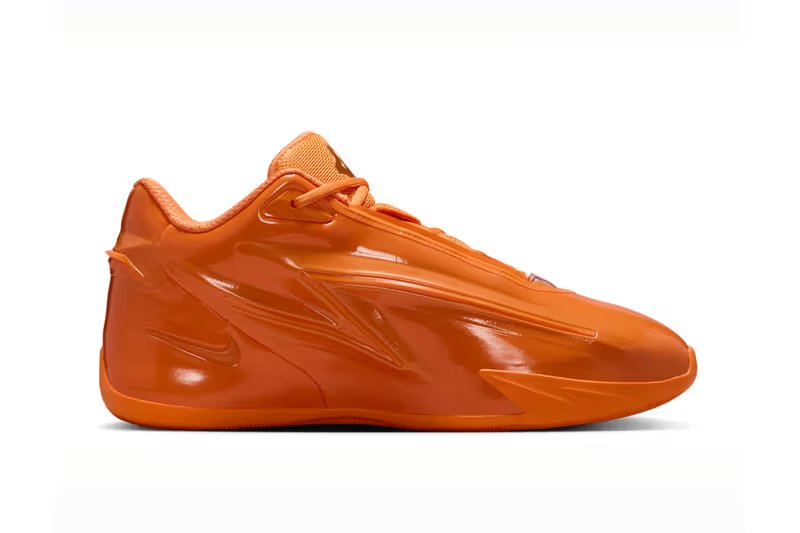 Nike KD 19 Orange Crush colorway featuring bright ceramic orange with stadium green and university gold accents - detail view 3