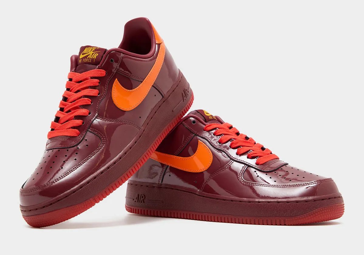 Nike Air Force 1 Patent in varsity red with high-gloss finish, white midsole and rubber toe cap - detail view 1