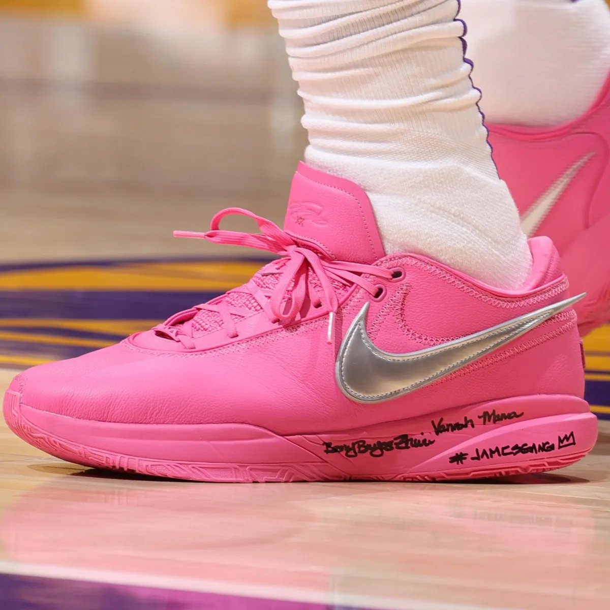 Nike LeBron 23 Hyper Pink, a all-pink basketball shoe with metallic silver Swoosh honoring LeBron James's all-time scoring record - detail view 2