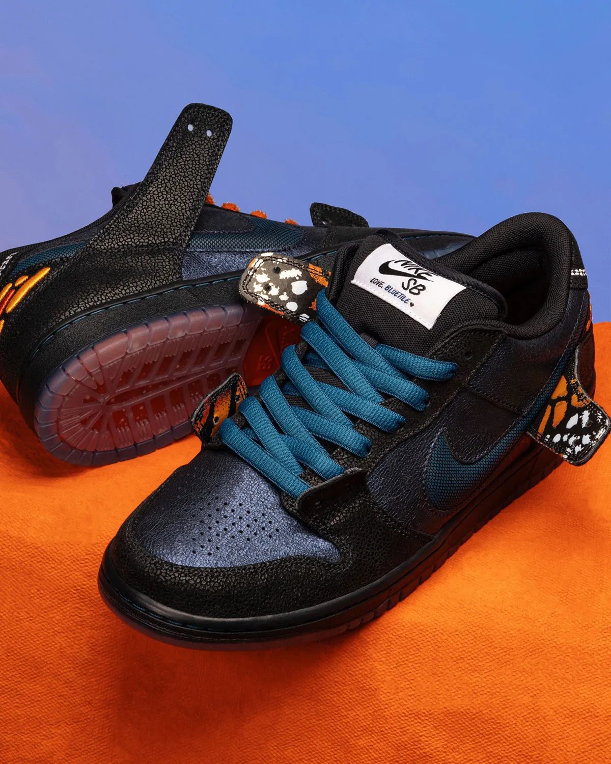 Bluetile x Nike SB Dunk Low Monarch Butterfly in orange and black with fuzzy lacing and hexagonal Swoosh detail - detail view 3