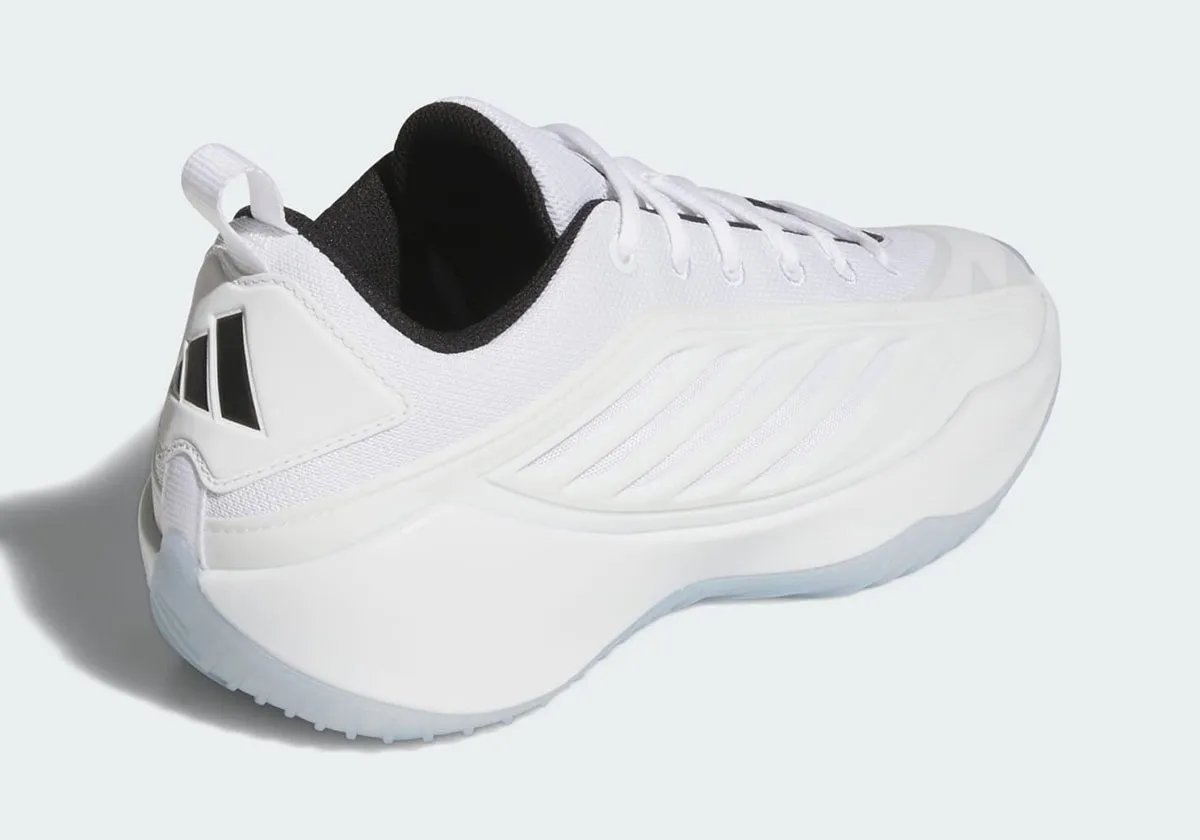 adidas Believe That 1 in Footwear White colorway with black trim and translucent traction, shown on-court - detail view 3