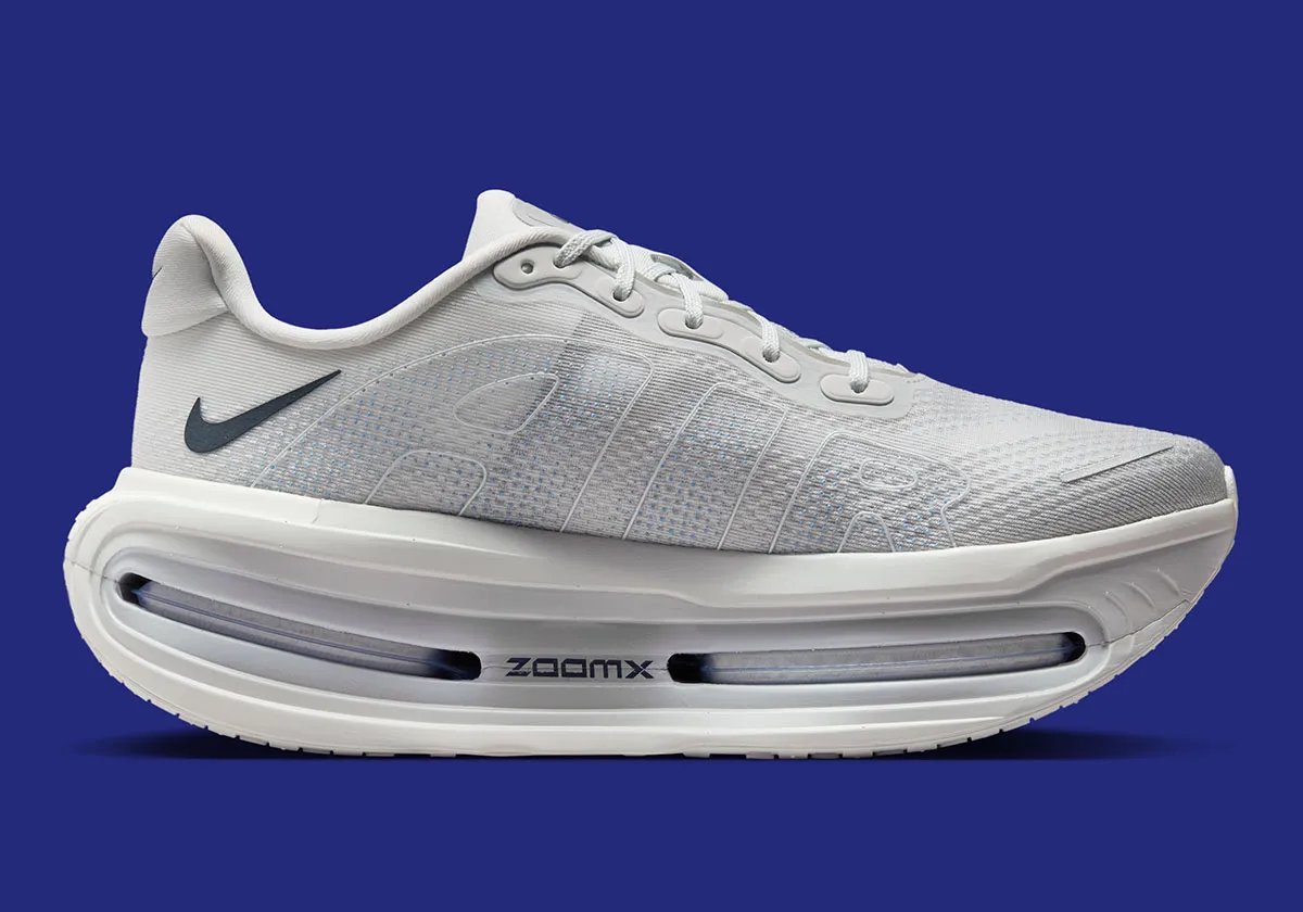 Nike Vomero Premium in Off White colorway with Dark Obsidian Swoosh, lateral view showing 55mm cushioning stack - detail view 3