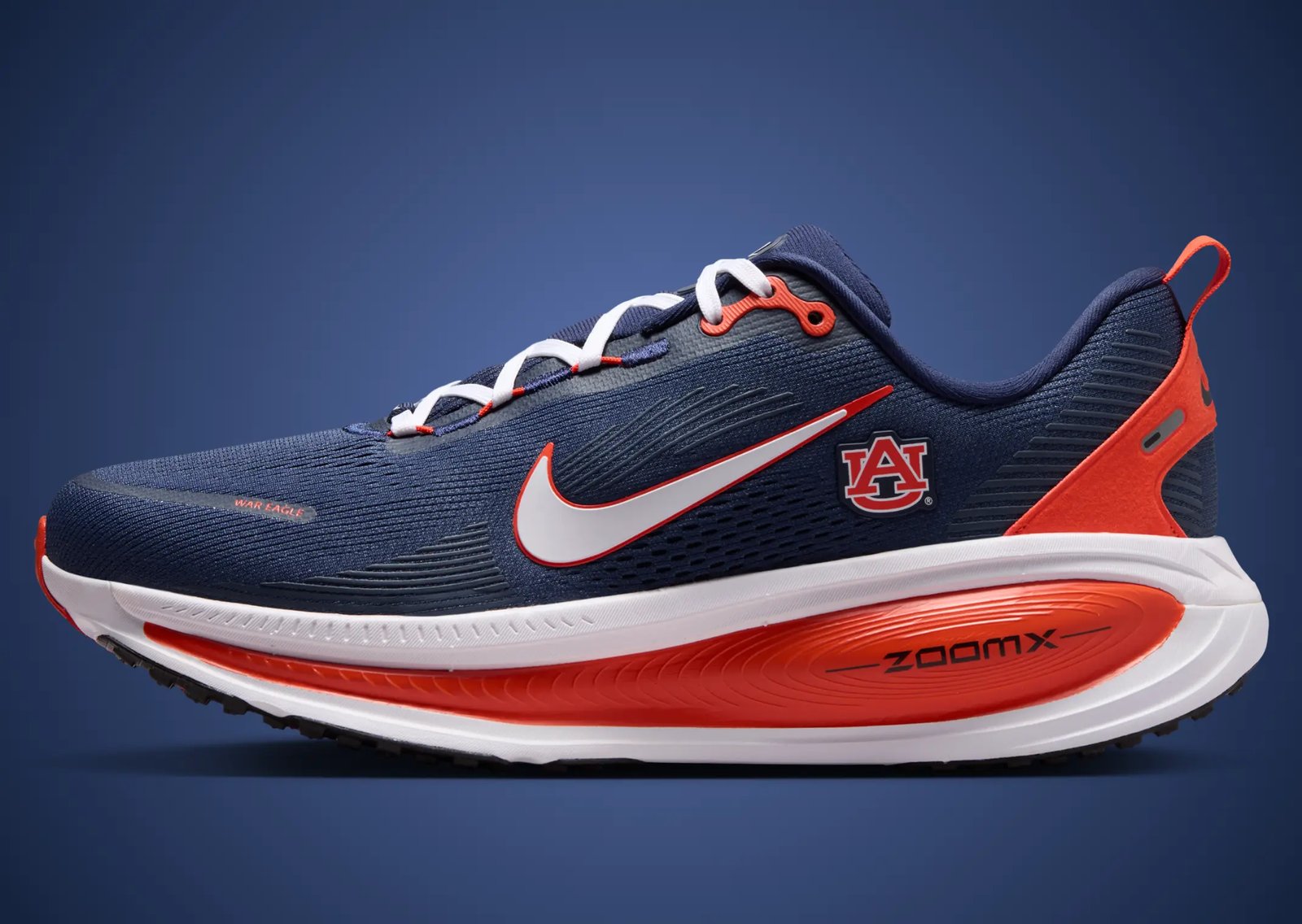Nike Vomero 18 NCAA Pack featuring multiple school colorways with institutional logos positioned beneath the lateral Swoosh panel - detail view 3