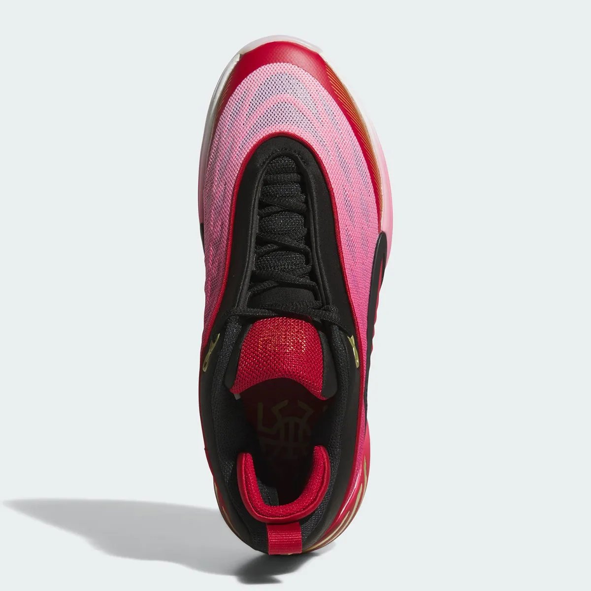 Adidas DON Issue #8 in Cavaliers wine, red, and gold colorway with gradient mesh upper and metallic gold branding - detail view 4