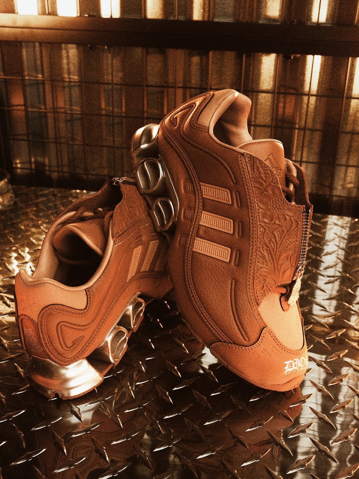 DIOS x adidas Megaride Friends & Family in saddle tan leather with embossed paisley shroud detail - detail view 3