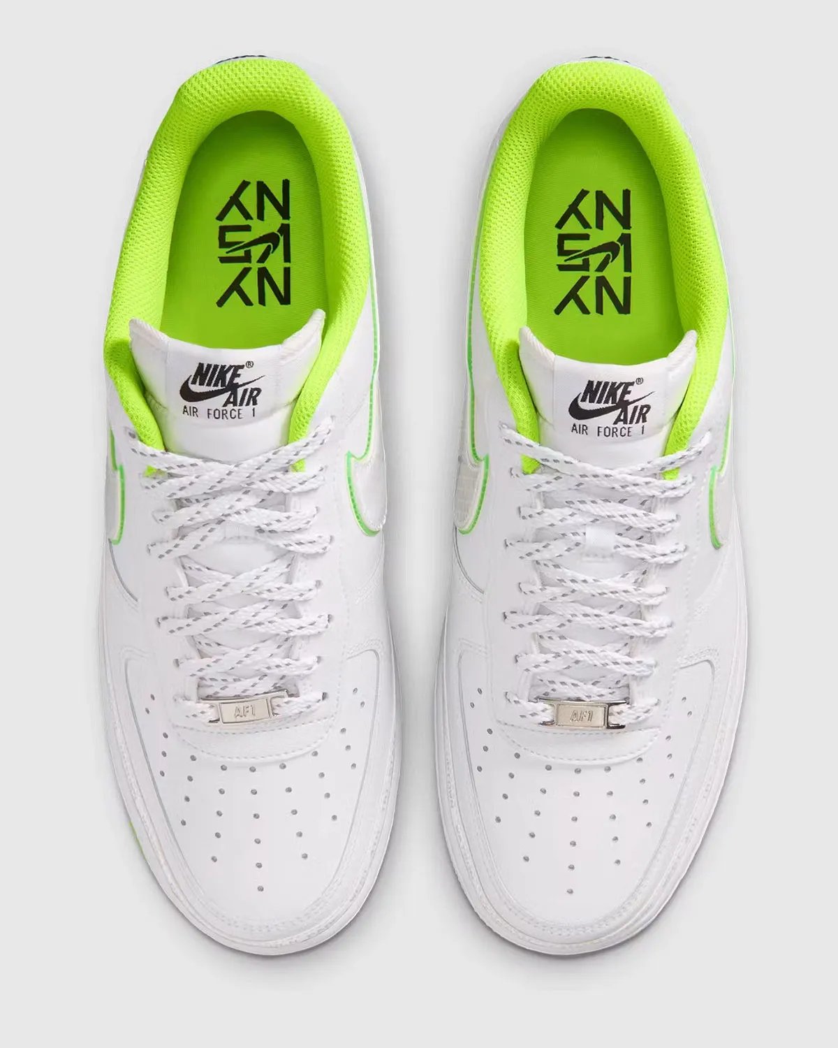 Nike Air Force 1 Low NY v. NY in triple white leather with hi-vis green foxing and embroidered New York court references - detail view 3