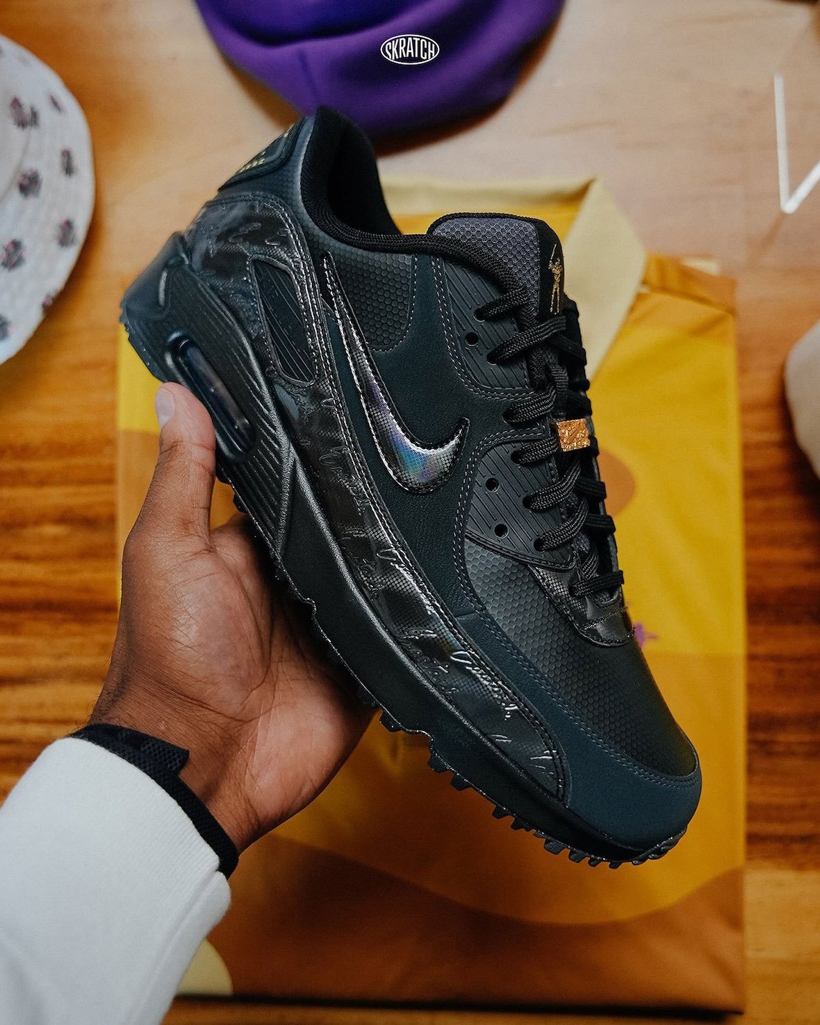 Eastside Golf x Nike Air Max 90 Golf in black with gold accents and honeycomb mesh detailing - detail view 2