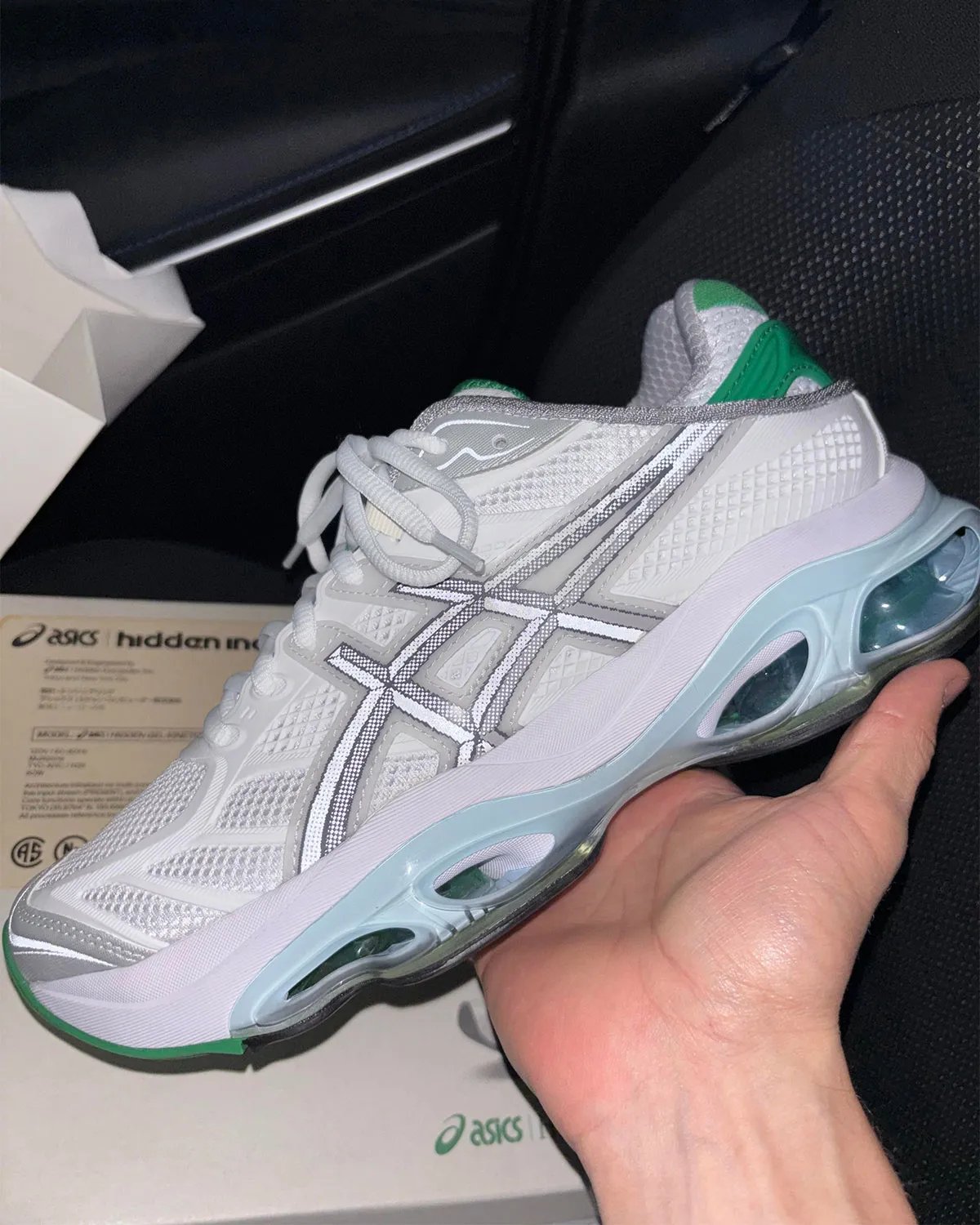 Hidden NY x ASICS GEL-Kinetic 2.0 collaboration featuring white upper with green heel overlay and half-tone ASICS strikes - detail view 1