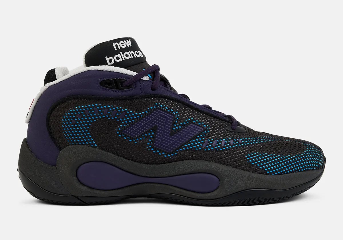 New Balance P400 in Black/Boysenberry colorway with Fresh Foam X cushioning, side view - detail view 1