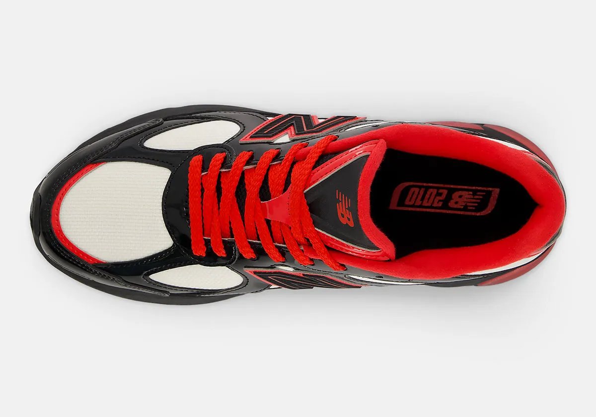 New Balance 2010 Firecracker colorway featuring off-white mesh, jet black patent leather, and fire red accents - detail view 3