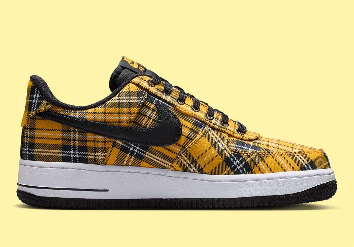 Nike Air Force 1 Low in yellow plaid with white upper and black trim, front three-quarter view - detail view 2