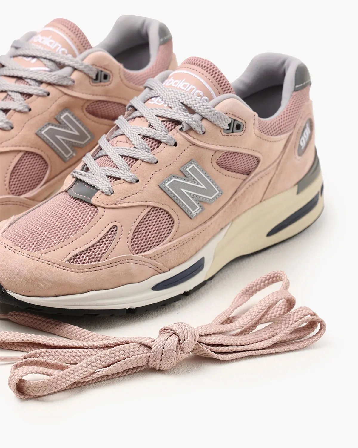 New Balance 991v2 in Mahogany Rose colorway, featuring suede and leather upper in warm brown tones - detail view 4