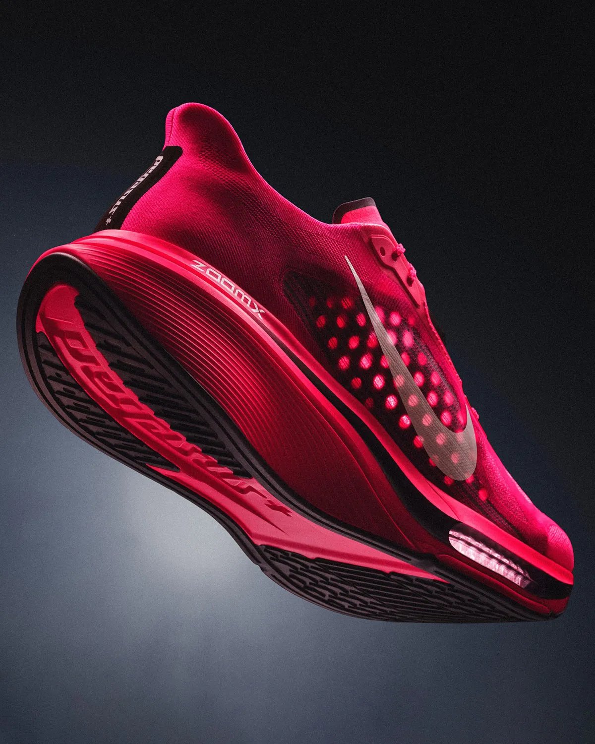 Nike Pegasus Plus 2 running shoe featuring visible Air Zoom midsole unit and ZoomX foam cushioning - detail view 1