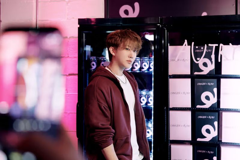Autry x Changbin capsule collection launch event in Seoul featuring pink-themed venue with reimagined Medalist and Hyperway sneakers displayed on elevated platforms - detail view 1