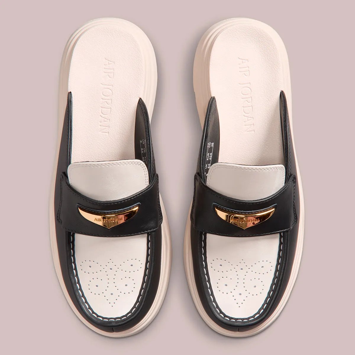 Air Jordan Mule in Chalk and Off Noir with ornamental brogue perforations on the toe box and metallic gold hardware - detail view 4