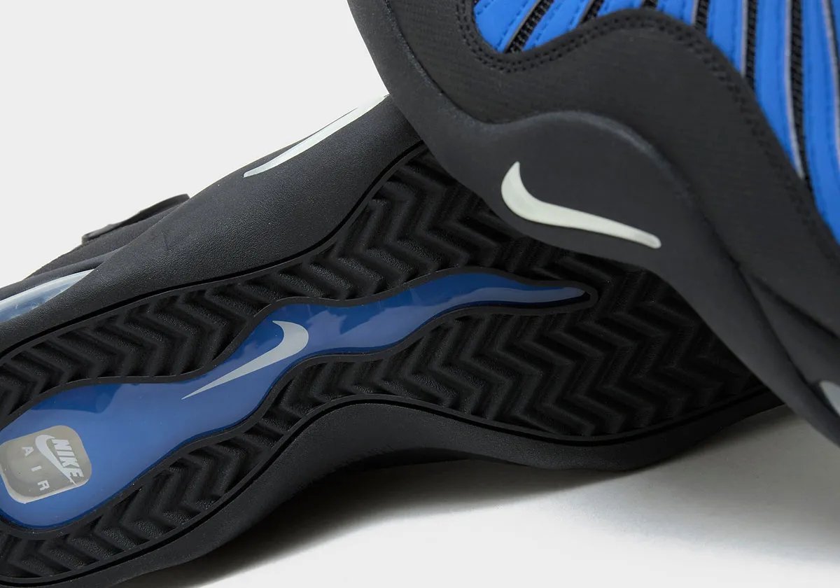 Nike Air Bakin Royal featuring wavy blue upper with Nike Air branding and black white sport split - detail view 2