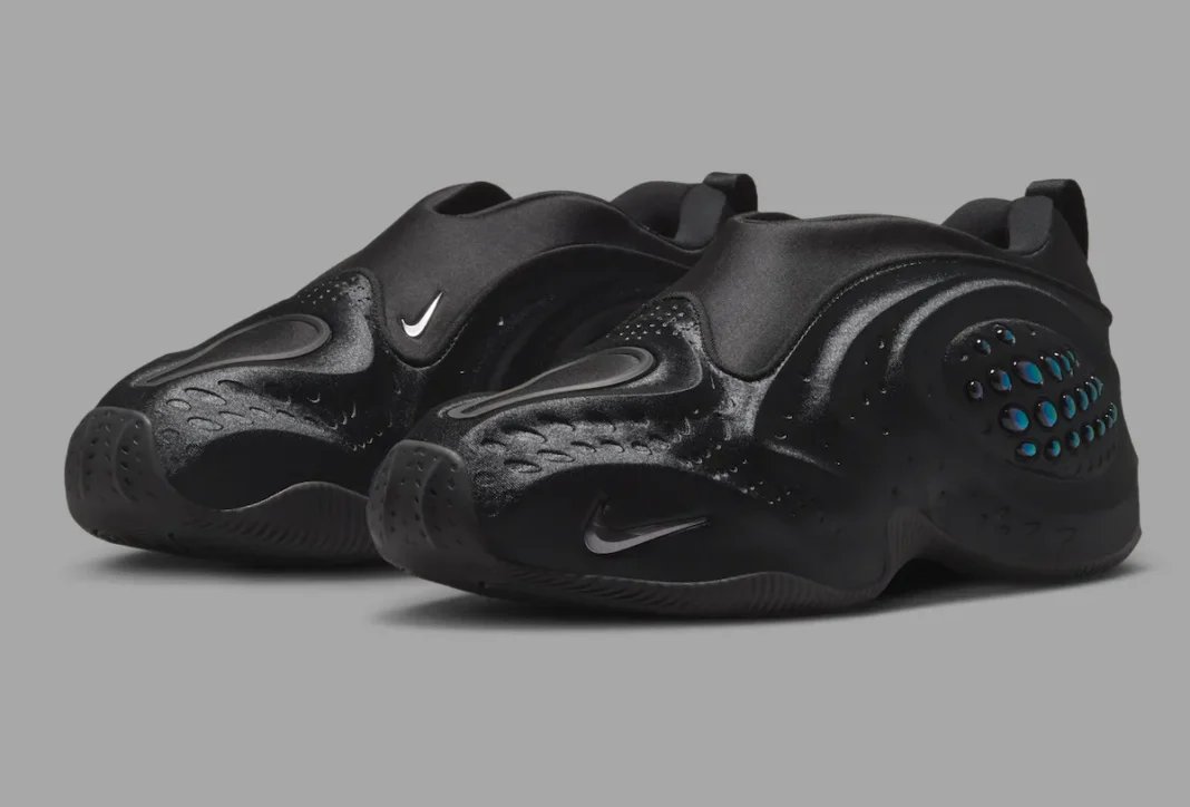 Nike First Sight Shadow in Black with Metallic Dark Grey accents, showing molded upper and sculptural texture details - detail view 1