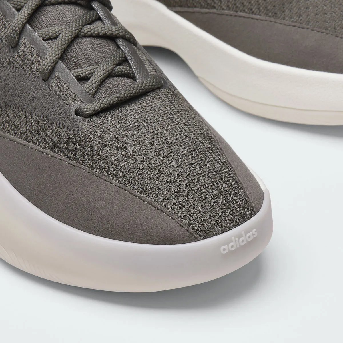 adidas Fear of God Athletics III in Cinder colorway showing grey upper with cream and white sole detailing - detail view 3