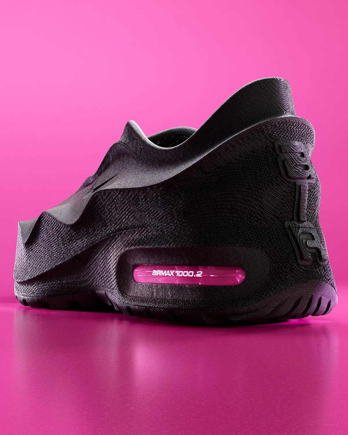Nike Air Max 1000.2 "Pink Spell" in black with colored Air unit detail, side profile view - detail view 1