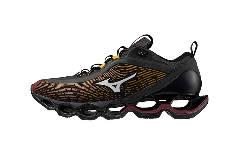 Mizuno Wave Prophecy 13.2 in Tokyo Sunset colorway featuring charcoal, white, and orange uppers with full-length Infinity Wave sole unit - detail view 3