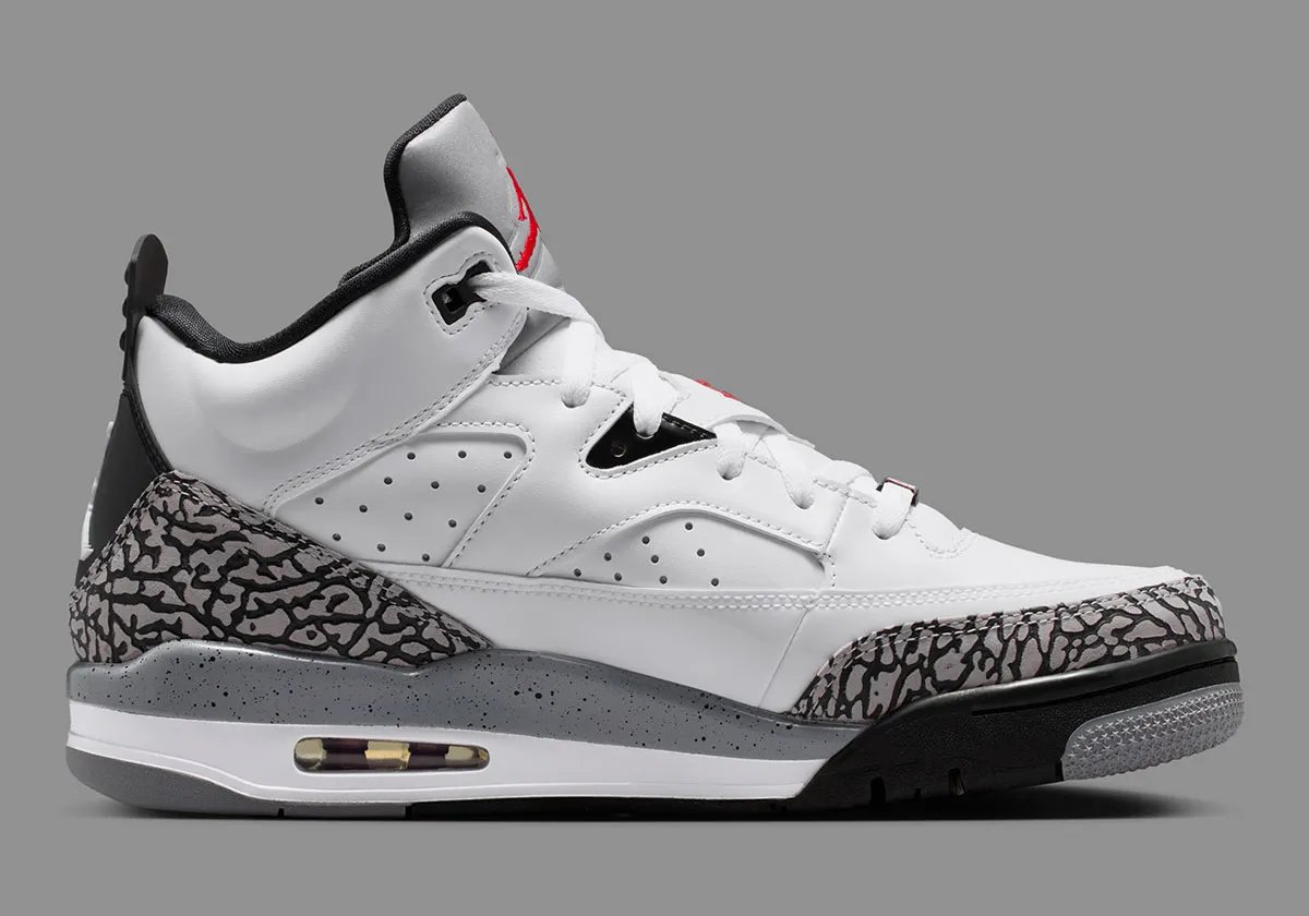 Jordan Son of Mars Low in White Cement colorway, showcasing white canvas upper with grey cement paneling and tonal midsole - detail view 3