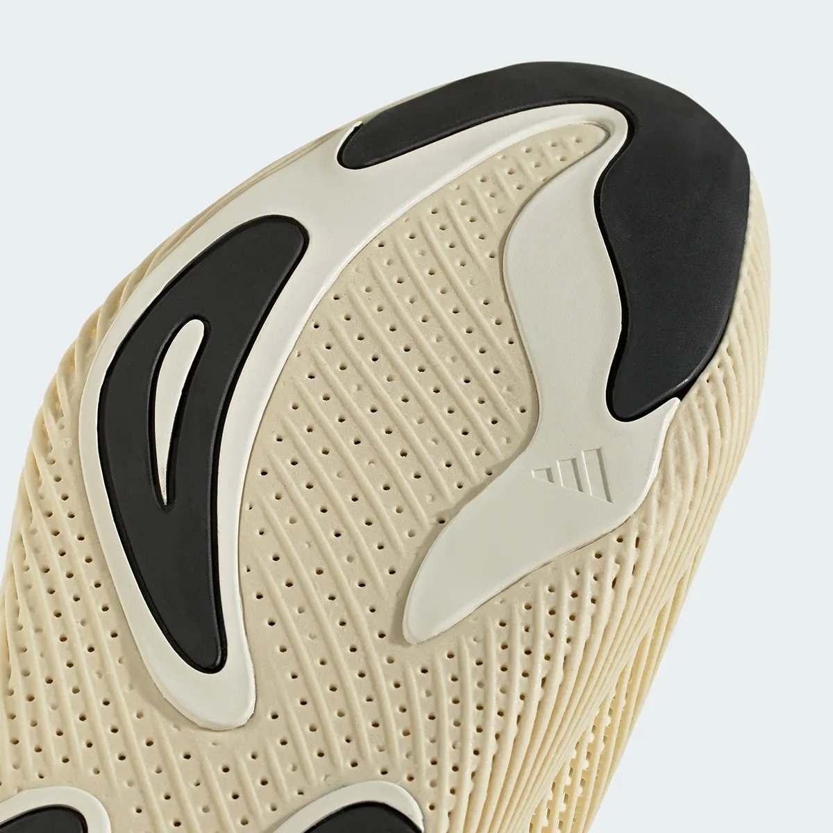 Adidas Futurecool 3D-printed sneaker featuring asymmetrical tongue and single-structure midsole in neutral colorway - detail view 5
